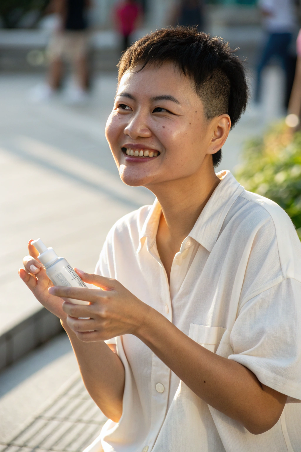 AI generated image by Red Panda AI: A candid photo of an Asian beauty with short hair, wearing a simple shirt. She has clear and natural facial features, bright lighting highlighting her smooth skin. Her hands are gently holding a cosmetic product in a casual and relaxed manner. The overall composition feels spontaneous and authentic, focusing on her natural beauty with no heavy edits or enhancements.